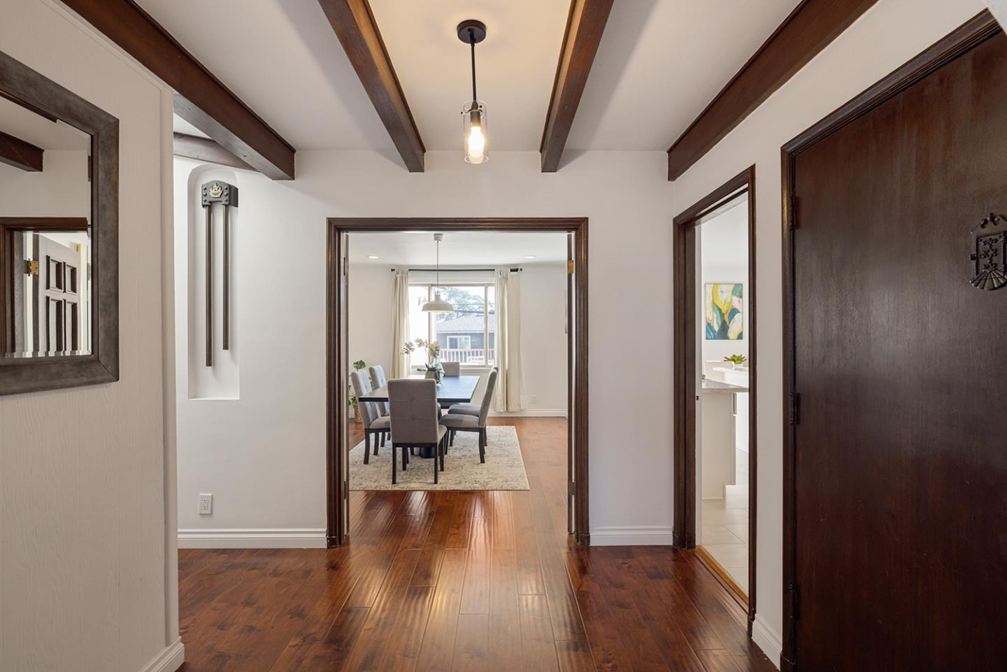 943 Hillcrest Boulevard Millbrae, CA 94030 - Photo 15 of 51 a view of a livingroom with furniture and hardwood floor