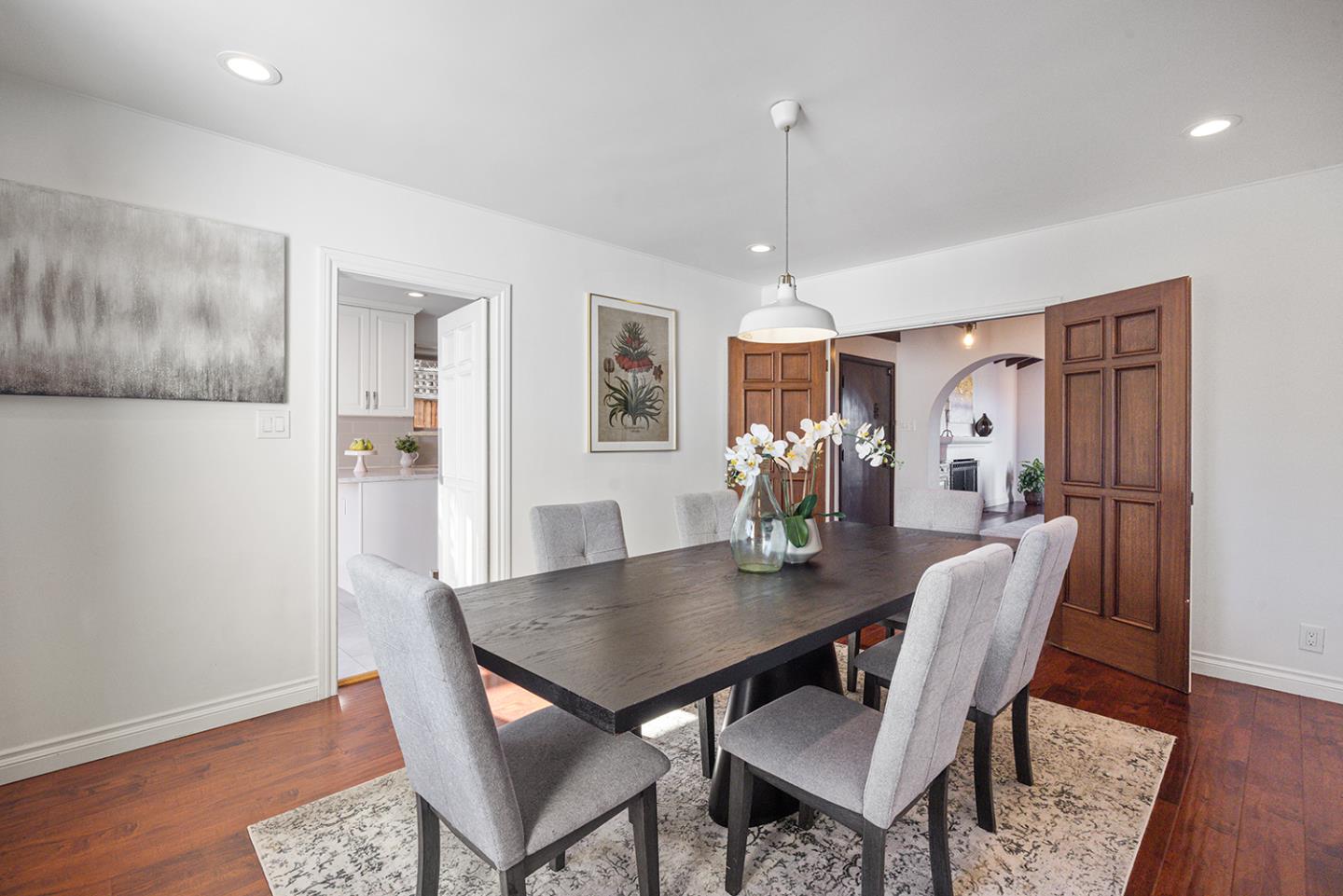 943 Hillcrest Boulevard Millbrae, CA 94030 - Photo 17 of 51 a view of a dining room with furniture window and wooden floor