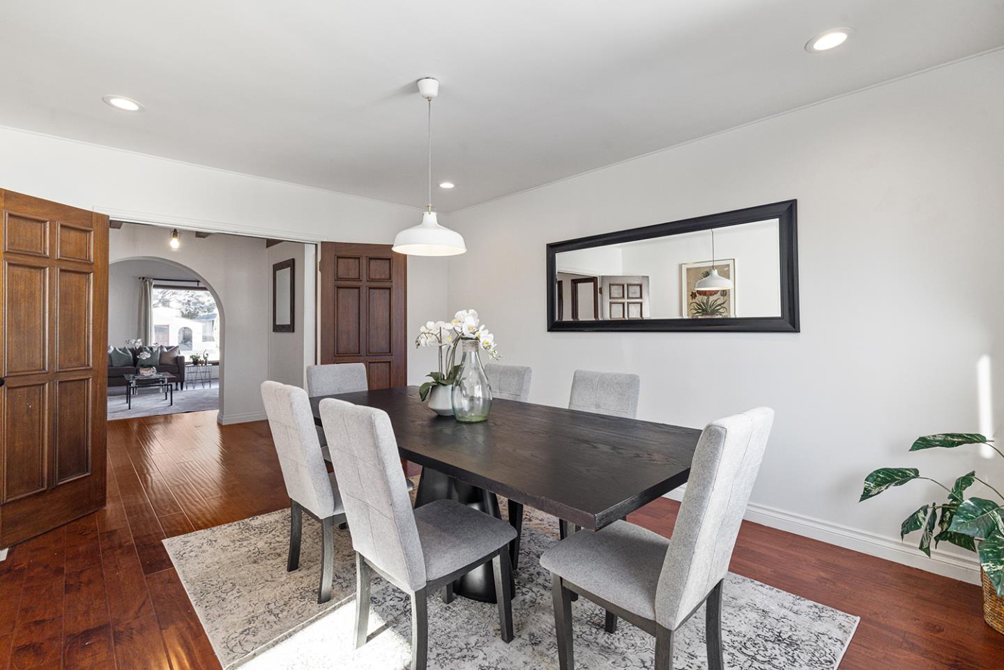 943 Hillcrest Boulevard Millbrae, CA 94030 - Photo 18 of 51 a view of a dining room with furniture and wooden floor