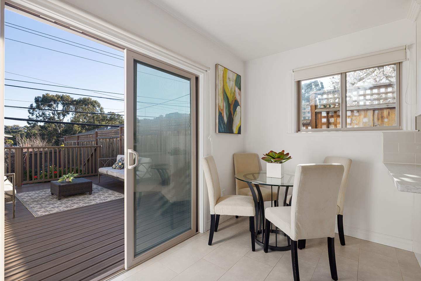 943 Hillcrest Boulevard Millbrae, CA 94030 - Photo 21 of 51 a view of a dining room with furniture window and wooden floor
