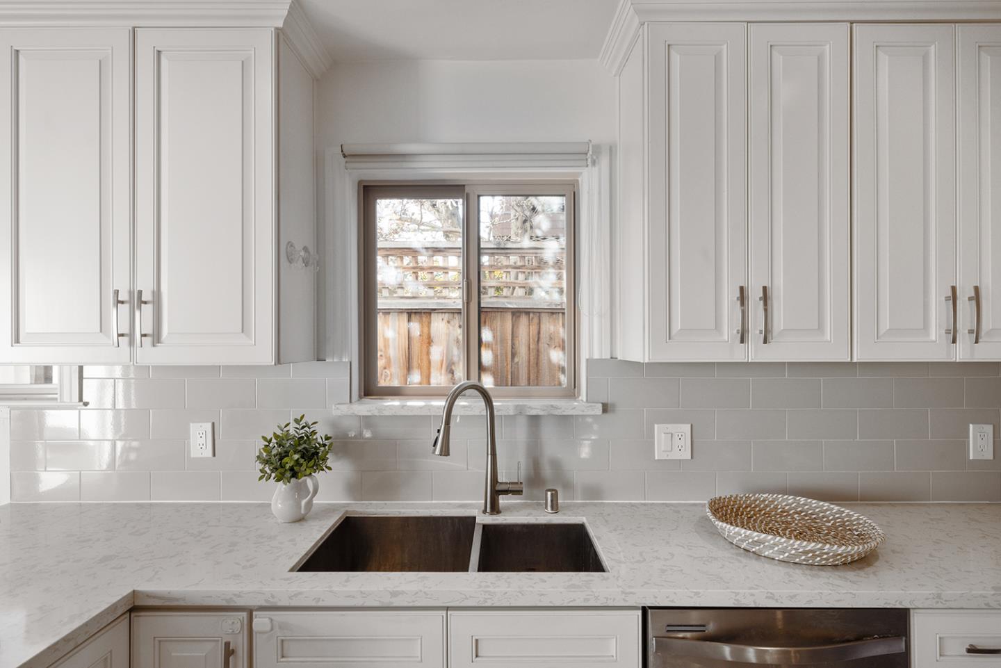 943 Hillcrest Boulevard Millbrae, CA 94030 - Photo 24 of 51 a kitchen with a sink and white cabinets