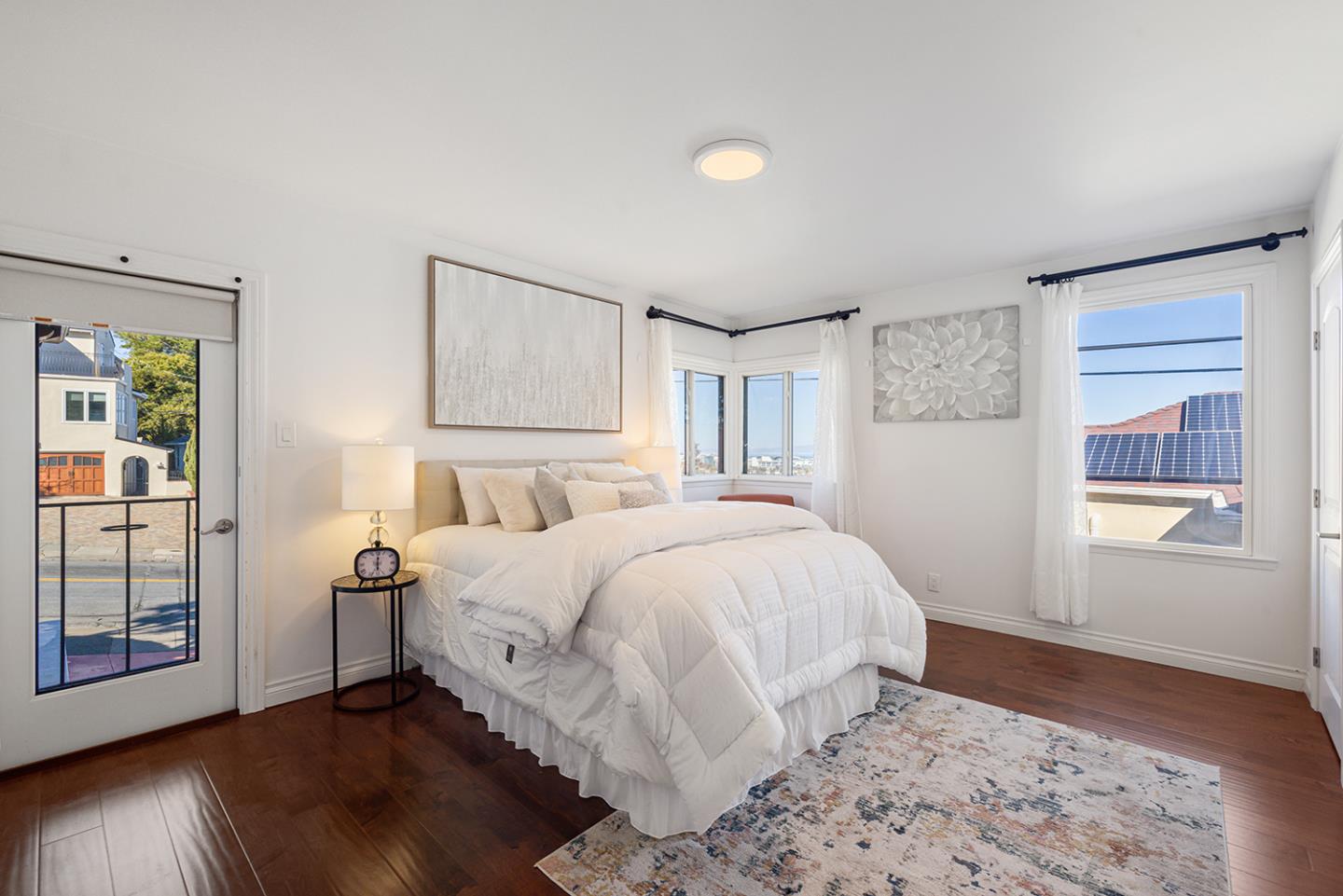 943 Hillcrest Boulevard Millbrae, CA 94030 - Photo 35 of 51 a bedroom with a bed and a window