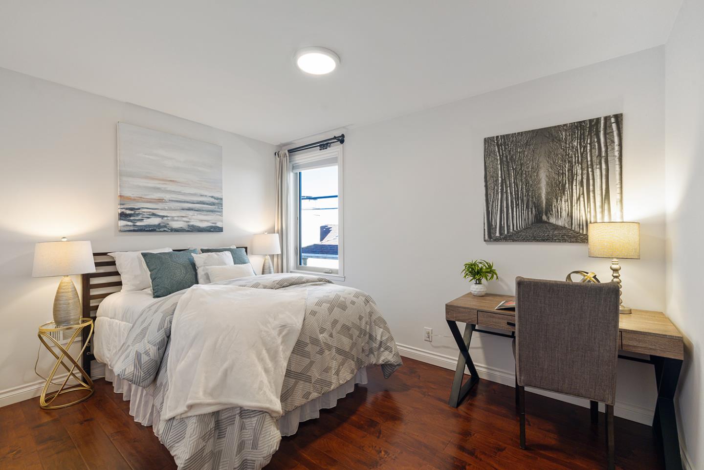 943 Hillcrest Boulevard Millbrae, CA 94030 - Photo 37 of 51 a bedroom with a bed and a table in it