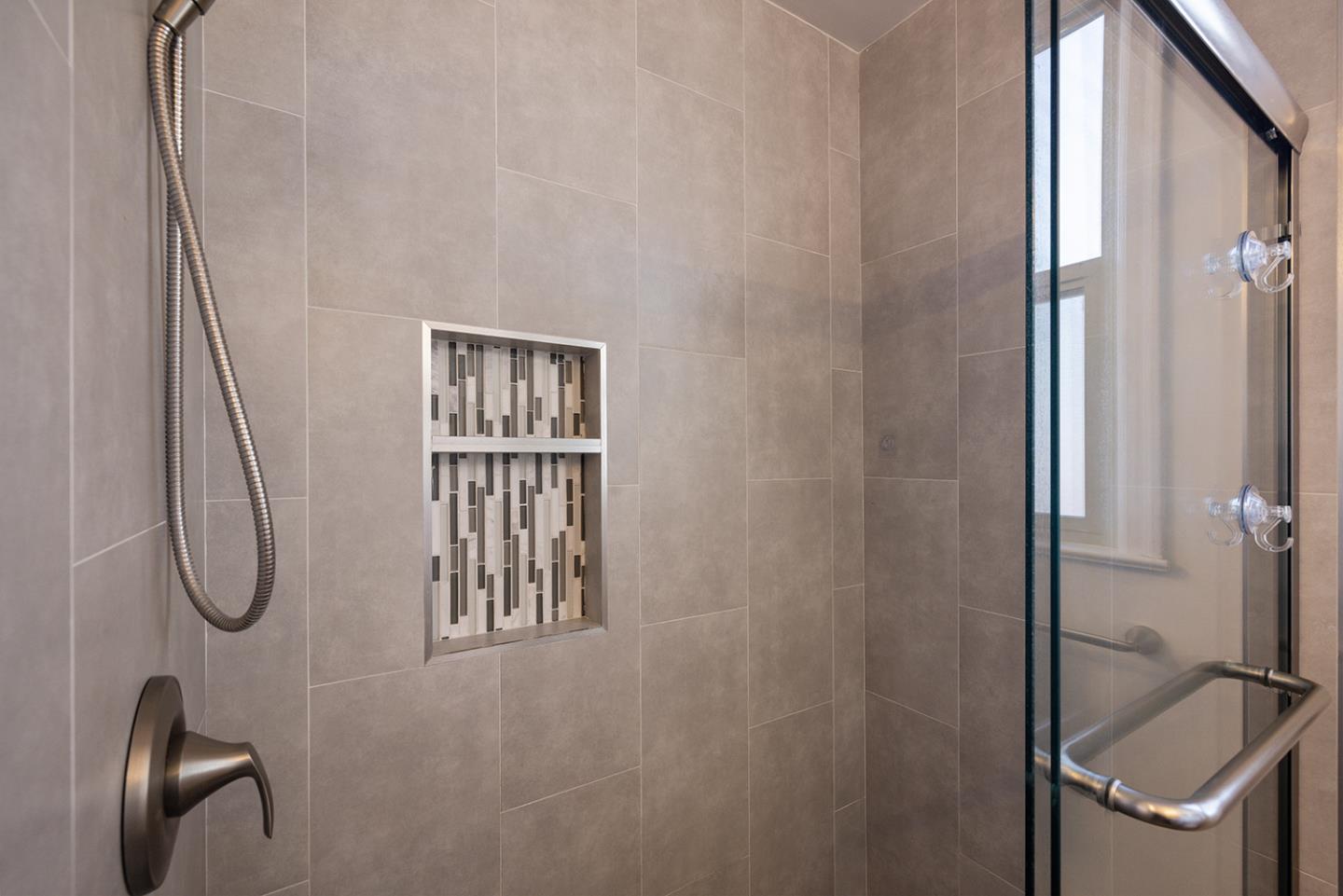 943 Hillcrest Boulevard Millbrae, CA 94030 - Photo 39 of 51 a bathroom with a sink a toilet and a mirror