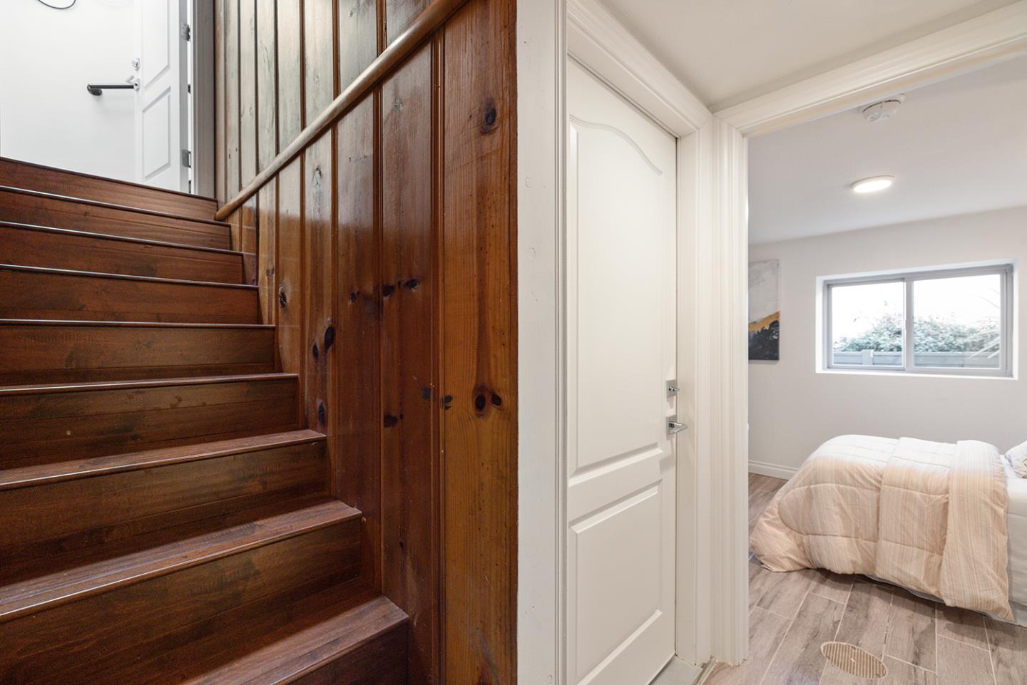943 Hillcrest Boulevard Millbrae, CA 94030 - Photo 40 of 51 a view of bedroom with wooden floor and a window