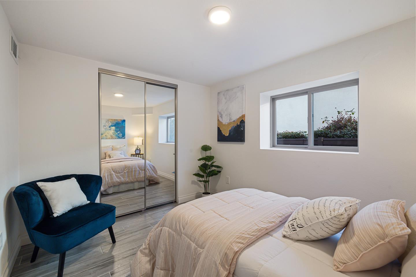 943 Hillcrest Boulevard Millbrae, CA 94030 - Photo 41 of 51 a bedroom with a bed and window