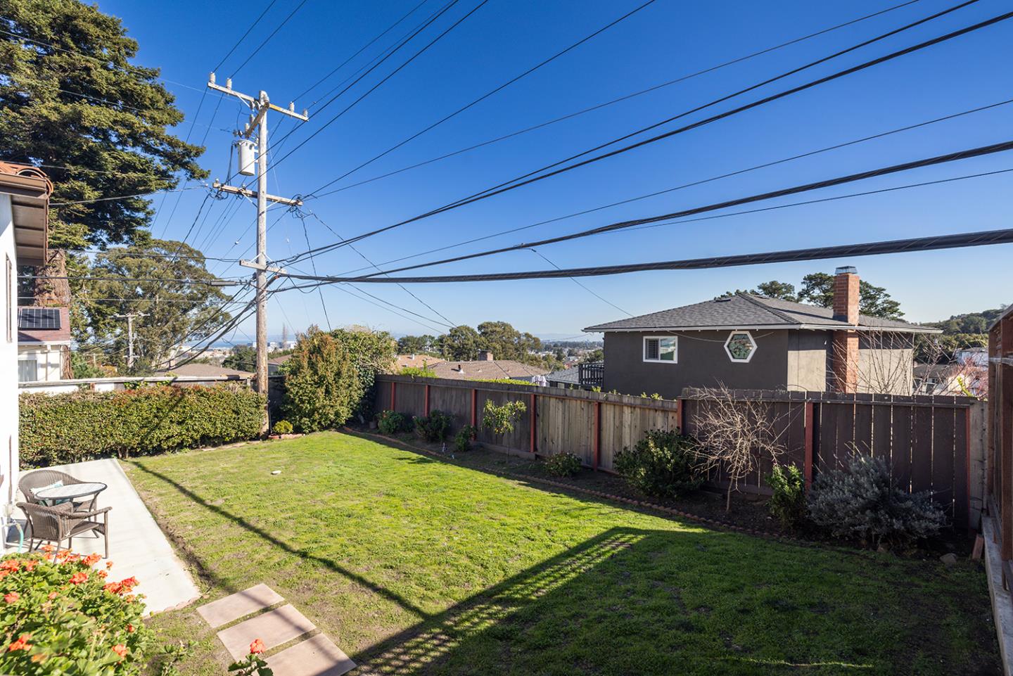943 Hillcrest Boulevard Millbrae, CA 94030 - Photo 48 of 51 a view of a backyard with a small cabin