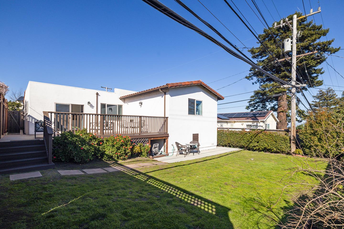 943 Hillcrest Boulevard Millbrae, CA 94030 - Photo 49 of 51 a view of a house with backyard and sitting area