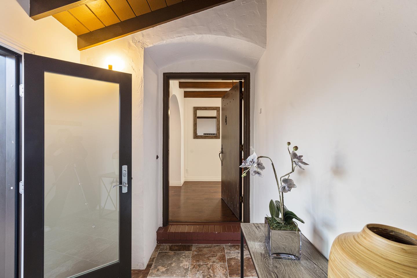 943 Hillcrest Boulevard Millbrae, CA 94030 - Photo 5 of 51 a view of an entryway with a mirror