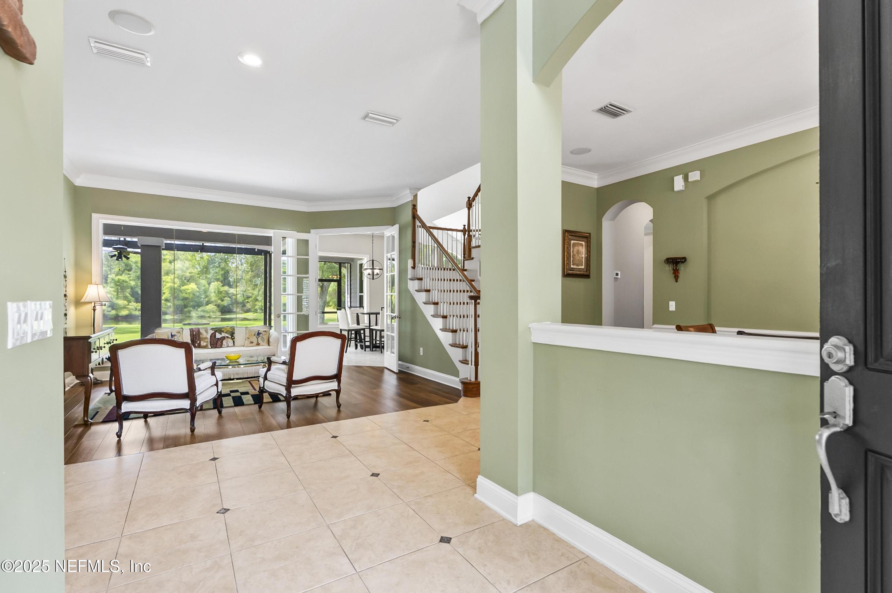 649 Treehouse Circle St. Augustine, FL 32095 - Photo 8 of 207 Bright Foyer with 20' ceilings