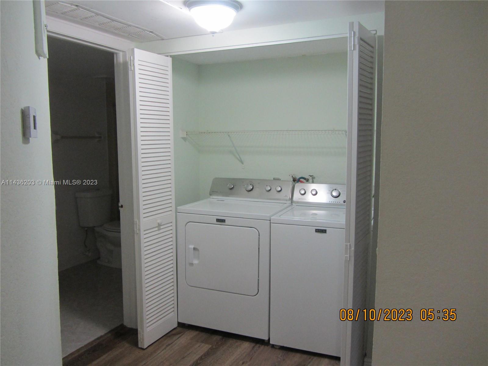 Doral Doral, FL 33166 - Photo 20 of 28 a utility room with dryer and washer