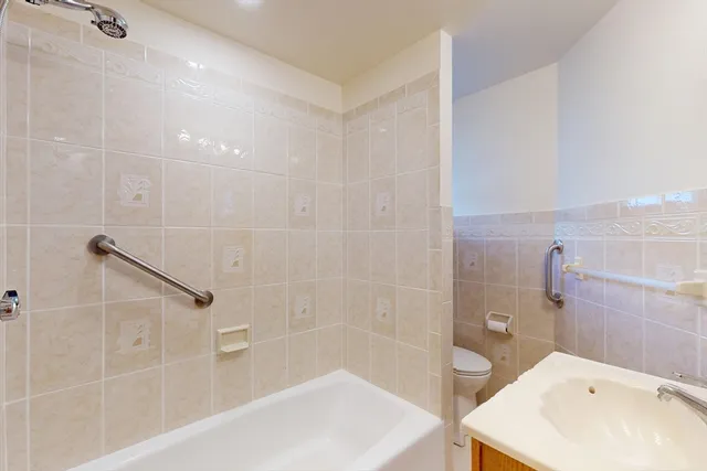 a bathroom with a shower and a bathtub