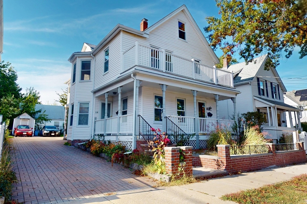 58 Teel Street, Unit 58 Arlington, MA 02474 - Photo 2 of 22 a front view of a house