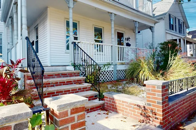 front view of a house with a deck