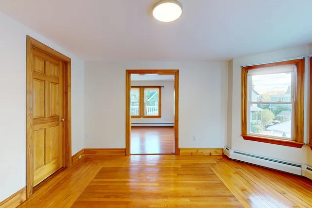 a view of an empty room and window