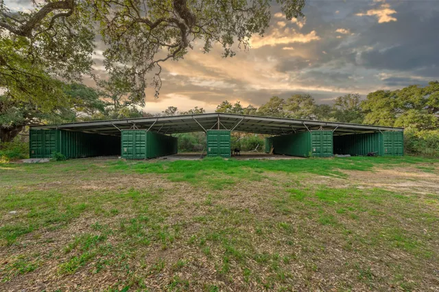 a backyard of a house with seating space