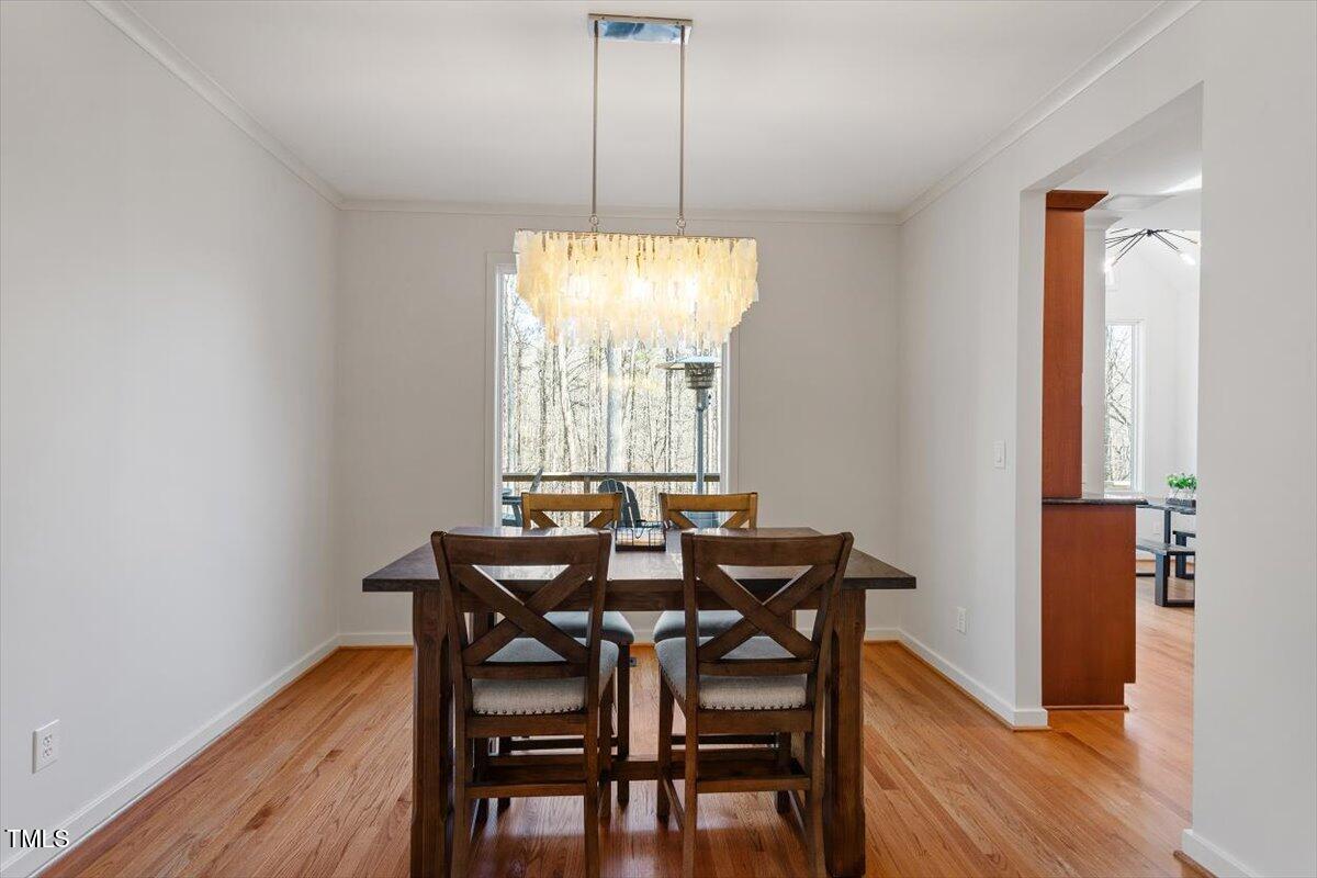 5920 Orchid Valley Road Raleigh, NC 27613 - Photo 20 of 54 Dining room facing rear deck