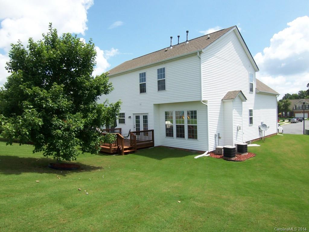415 Lafinca Court Fort Mill, SC 29708 - Photo 16 of 17 a front view of a house with a yard and trees