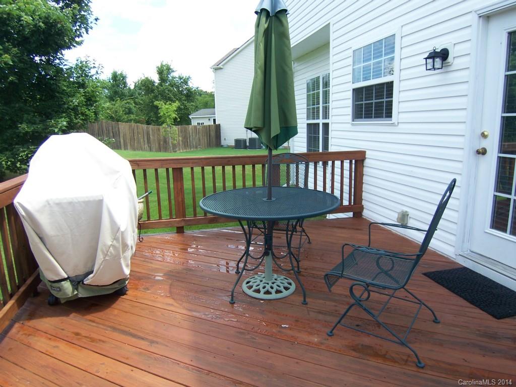 415 Lafinca Court Fort Mill, SC 29708 - Photo 17 of 17 a view of a chairs in wooden deck