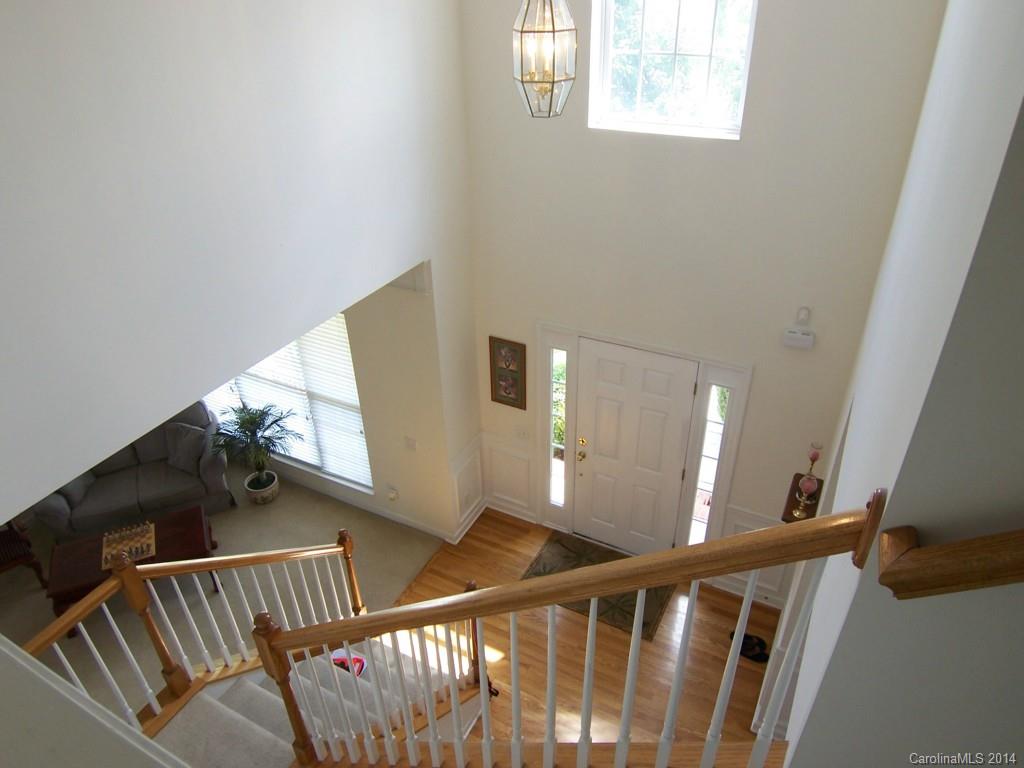 415 Lafinca Court Fort Mill, SC 29708 - Photo 3 of 17 a view of staircase with railing and white walls