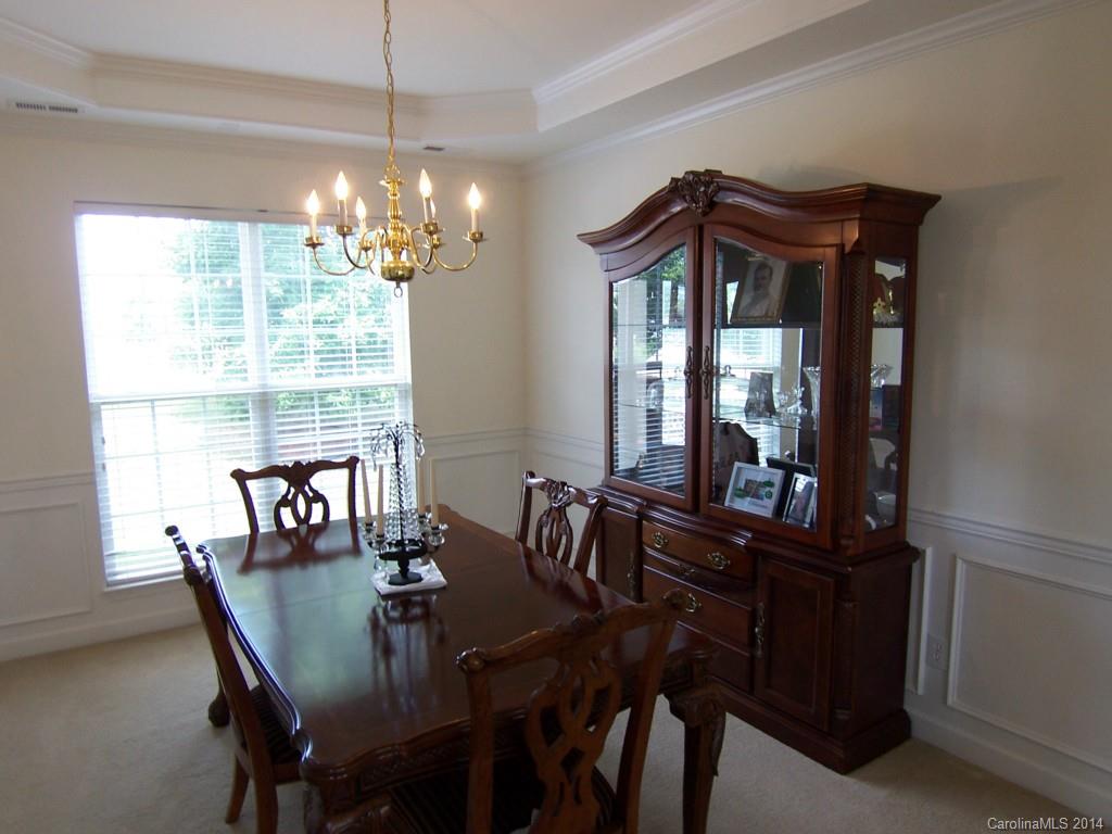 415 Lafinca Court Fort Mill, SC 29708 - Photo 5 of 17 a view of a dining room with furniture window and outside view