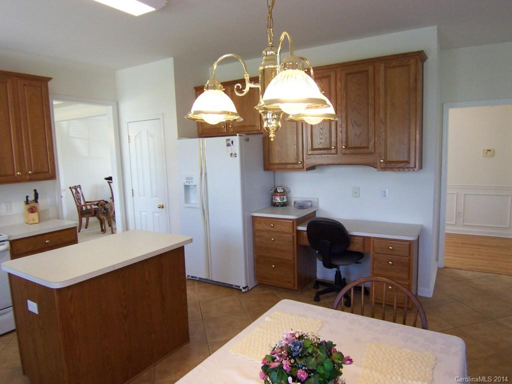 415 Lafinca Court Fort Mill, SC 29708 - Photo 8 of 17 a view of kitchen and breakfast area