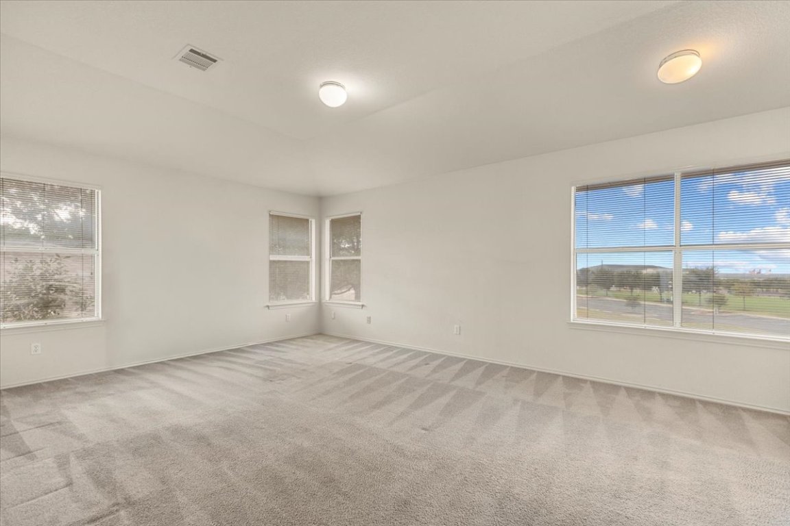 3929 Katzman Drive Austin, TX 78728 - Photo 12 of 29 a view of an empty room with a window
