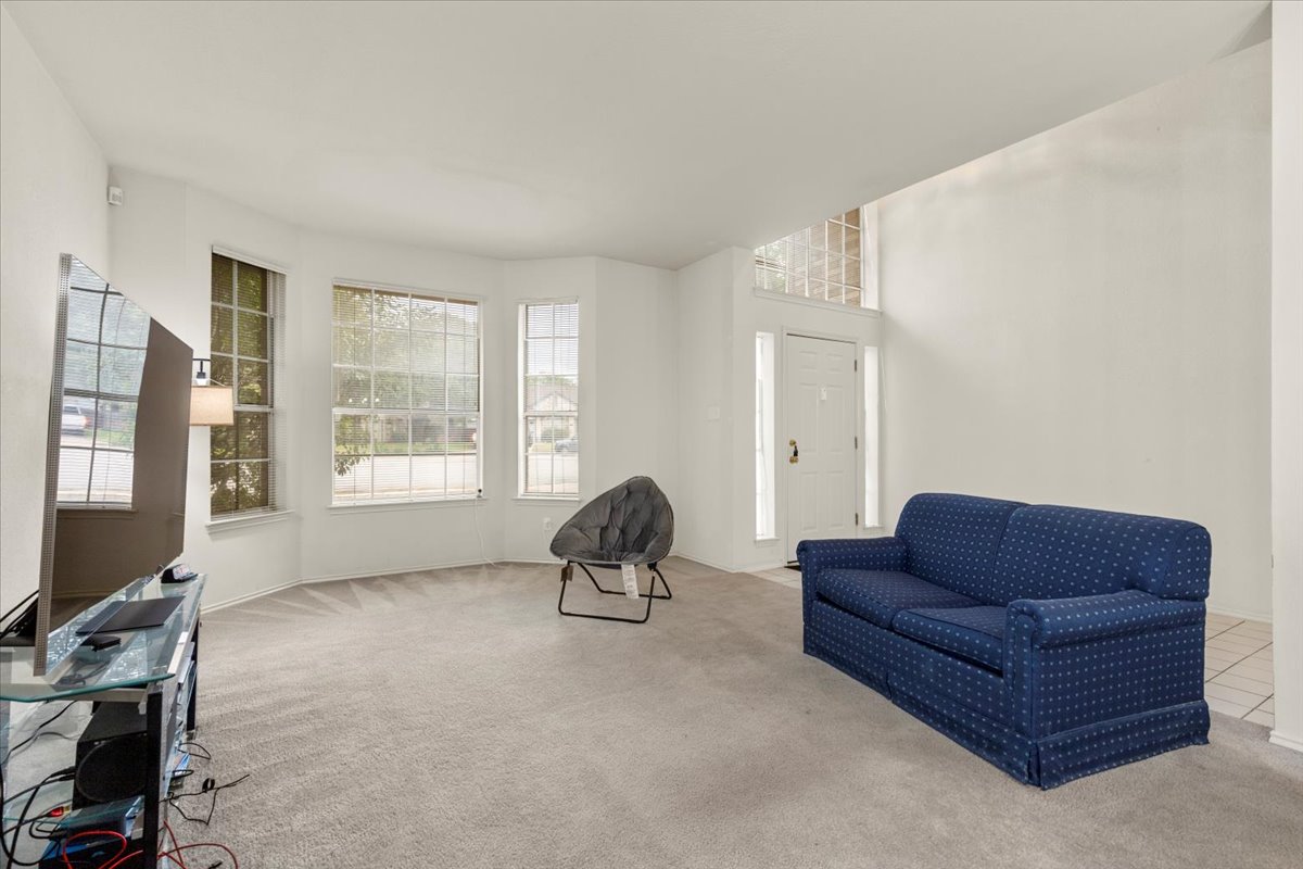 3929 Katzman Drive Austin, TX 78728 - Photo 5 of 29 Living area with carpet flooring