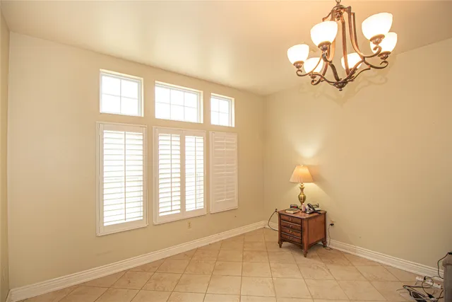 a view of a room with a chandelier
