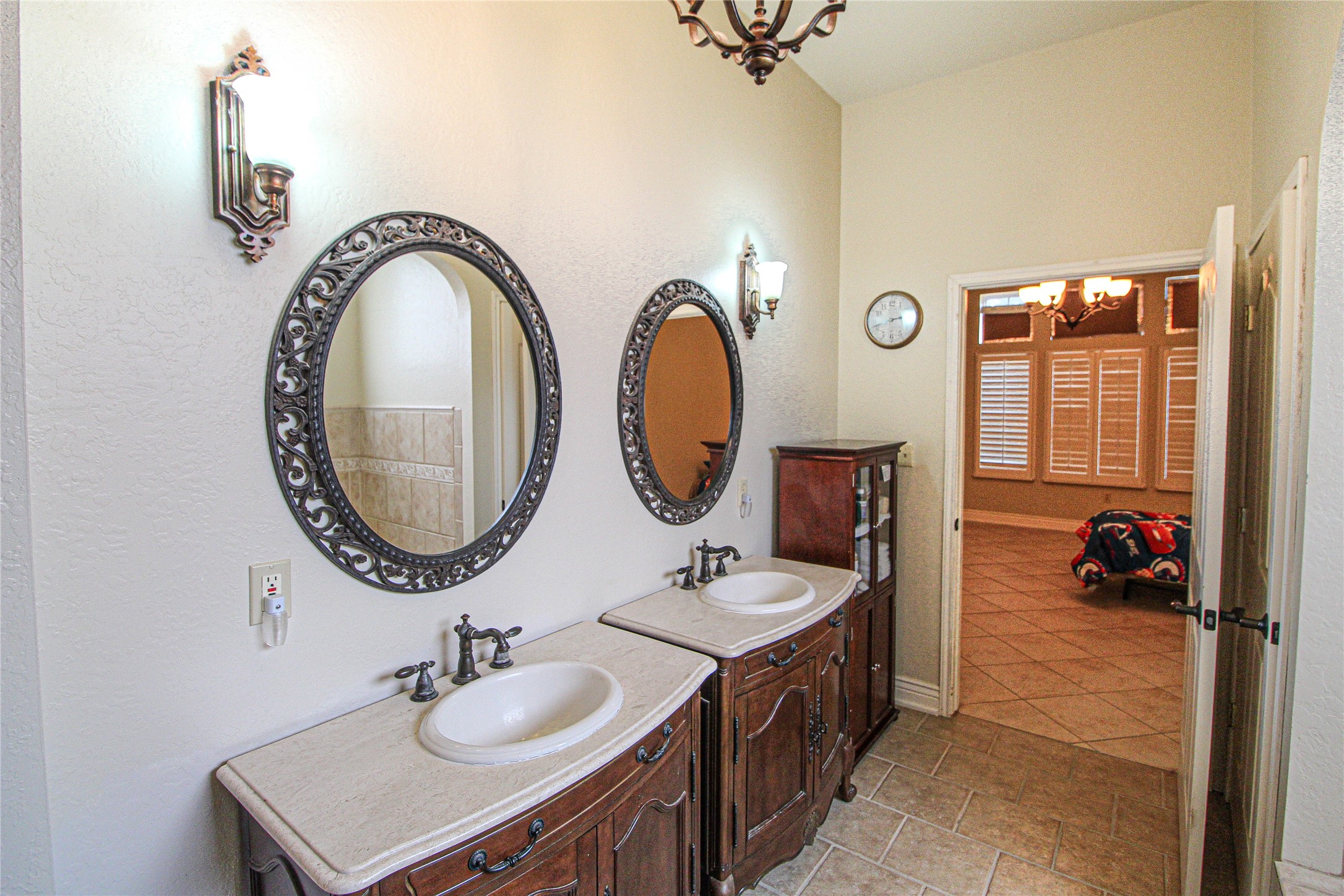 139 Berts Farm Road Livingston, TX 77351 - Photo 14 of 41 a bathroom with a sink and a mirror