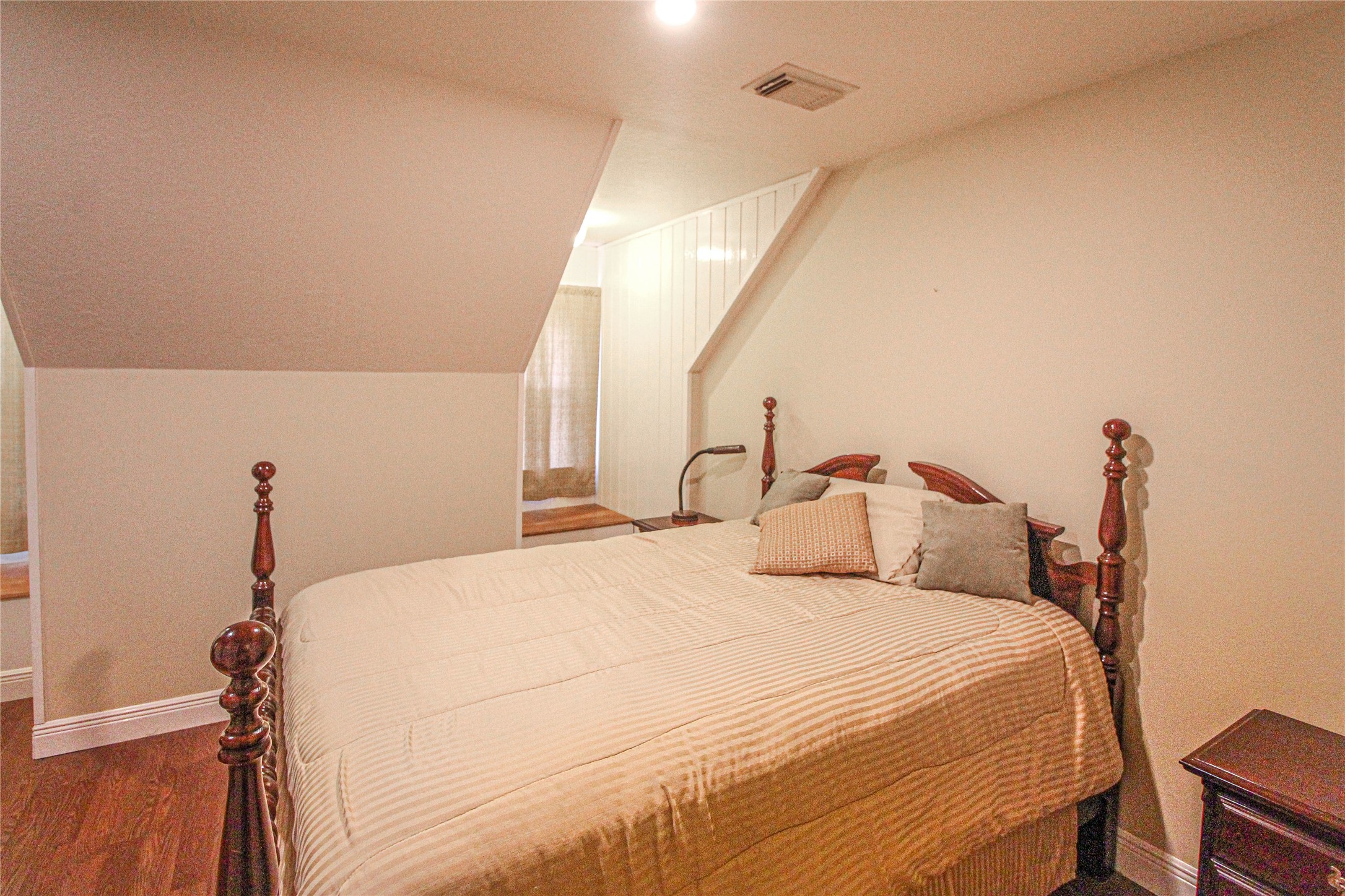 139 Berts Farm Road Livingston, TX 77351 - Photo 15 of 41 a bedroom with a bed and a night stand