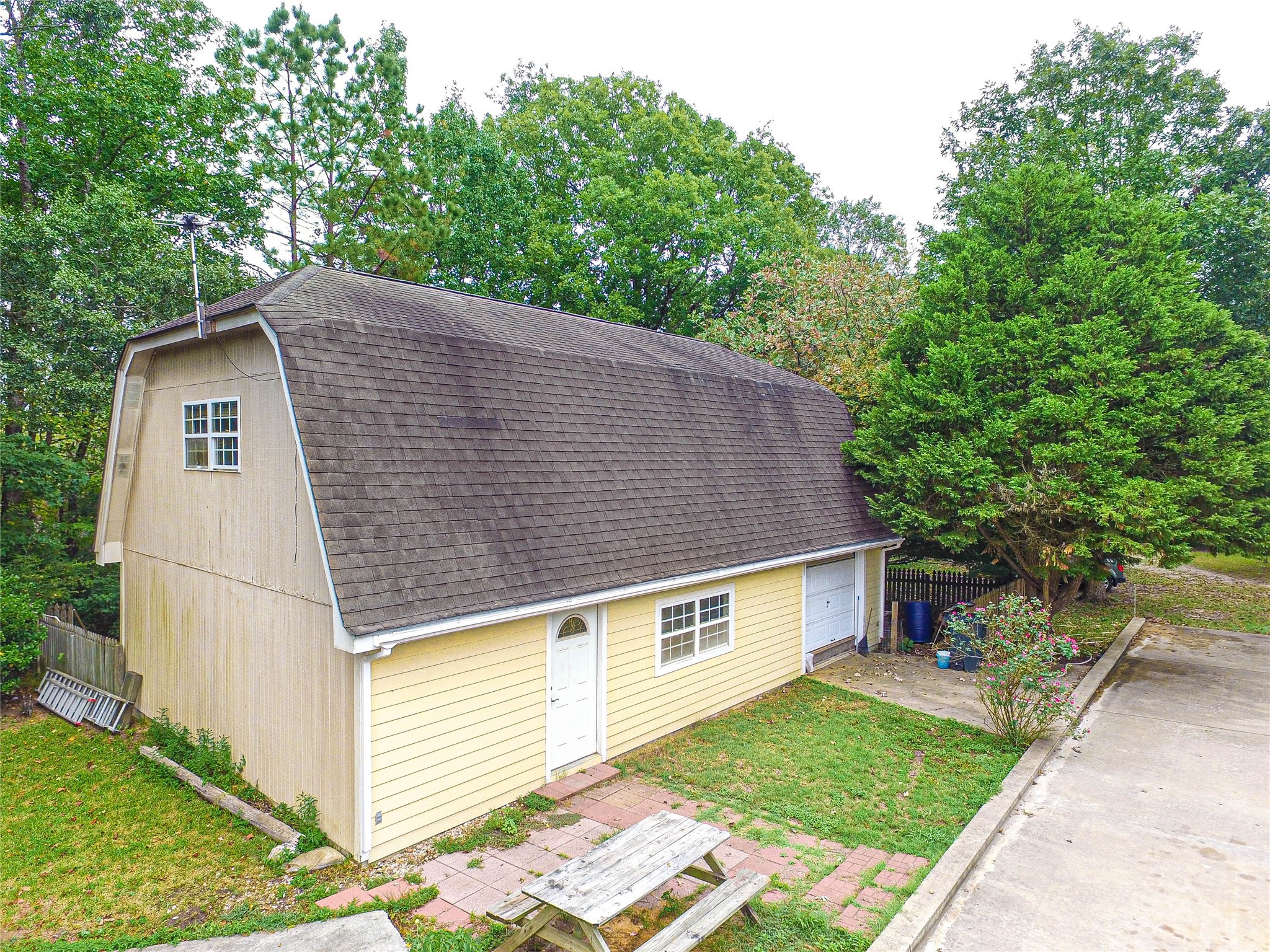 139 Berts Farm Road Livingston, TX 77351 - Photo 24 of 41 a aerial view of a house next to a yard with plants and trees