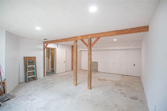 an empty room with closet area