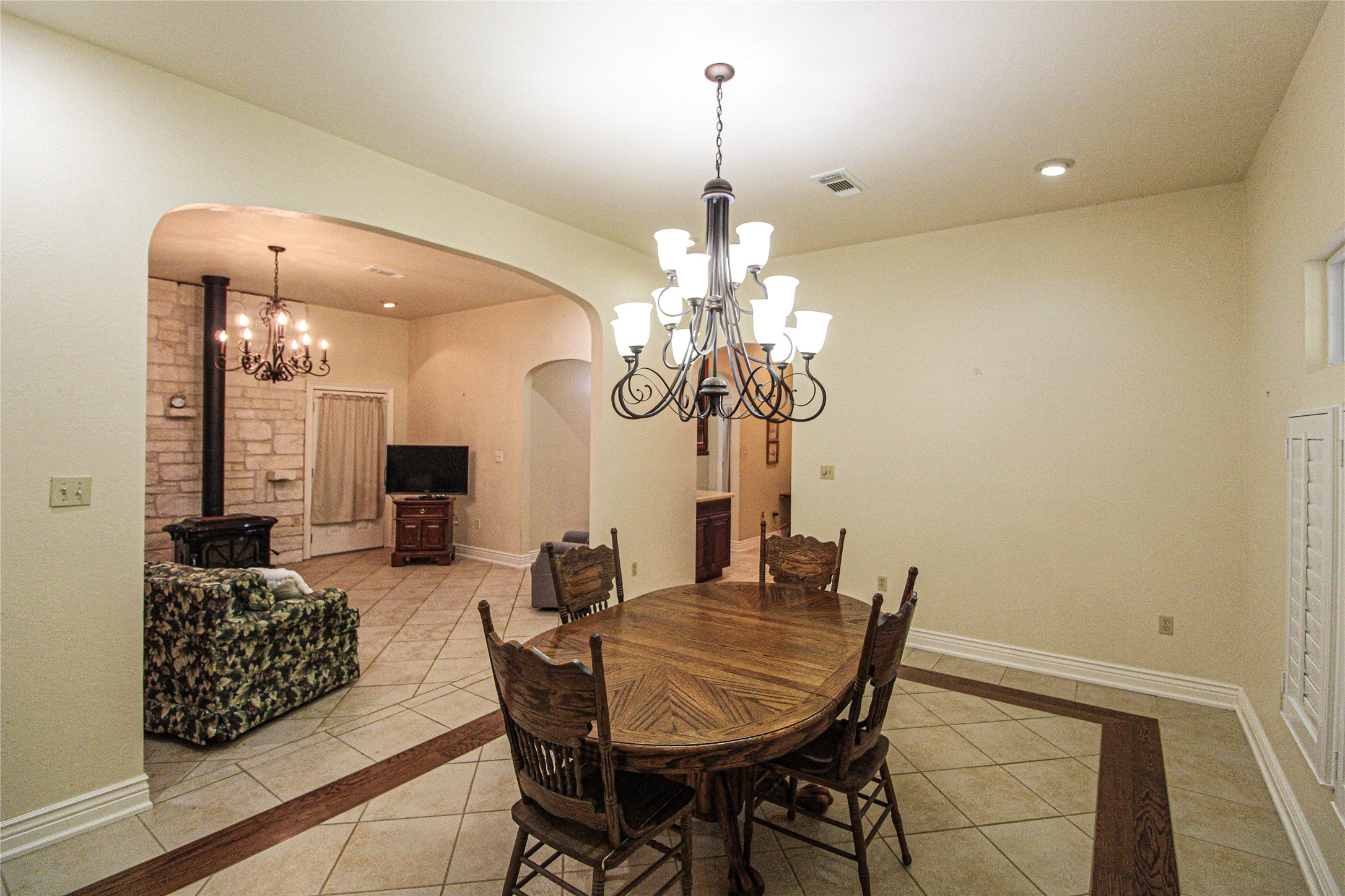 139 Berts Farm Road Livingston, TX 77351 - Photo 7 of 41 a view of a dining room with furniture and chandelier