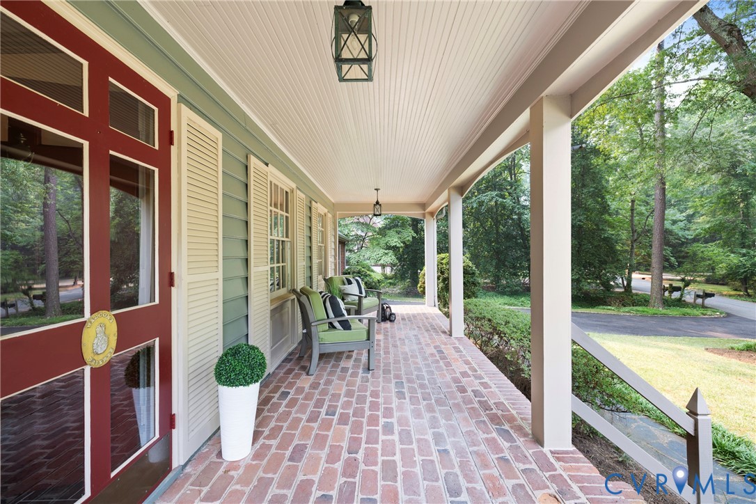 4501 Menokin Road Richmond, VA 23225 - Photo 4 of 42 Spacious country covered brick porch featuring a b