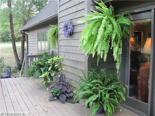 6100 Meadow Bluff Lane Oak Ridge, NC 27310 - Photo 12 of 16 Other. Deck on back of house