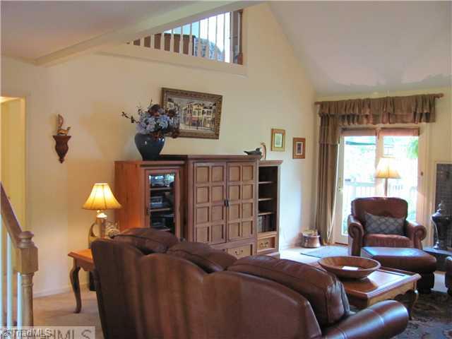 6100 Meadow Bluff Lane Oak Ridge, NC 27310 - Photo 4 of 16 Den/Family/Great Room. Open family room - great for entertaining - great flow to kitchen and dining room