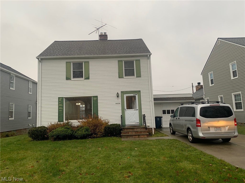 View of front of house with a front lawn
