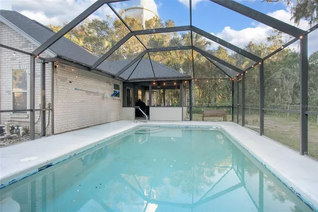 a view of a house with a swimming pool