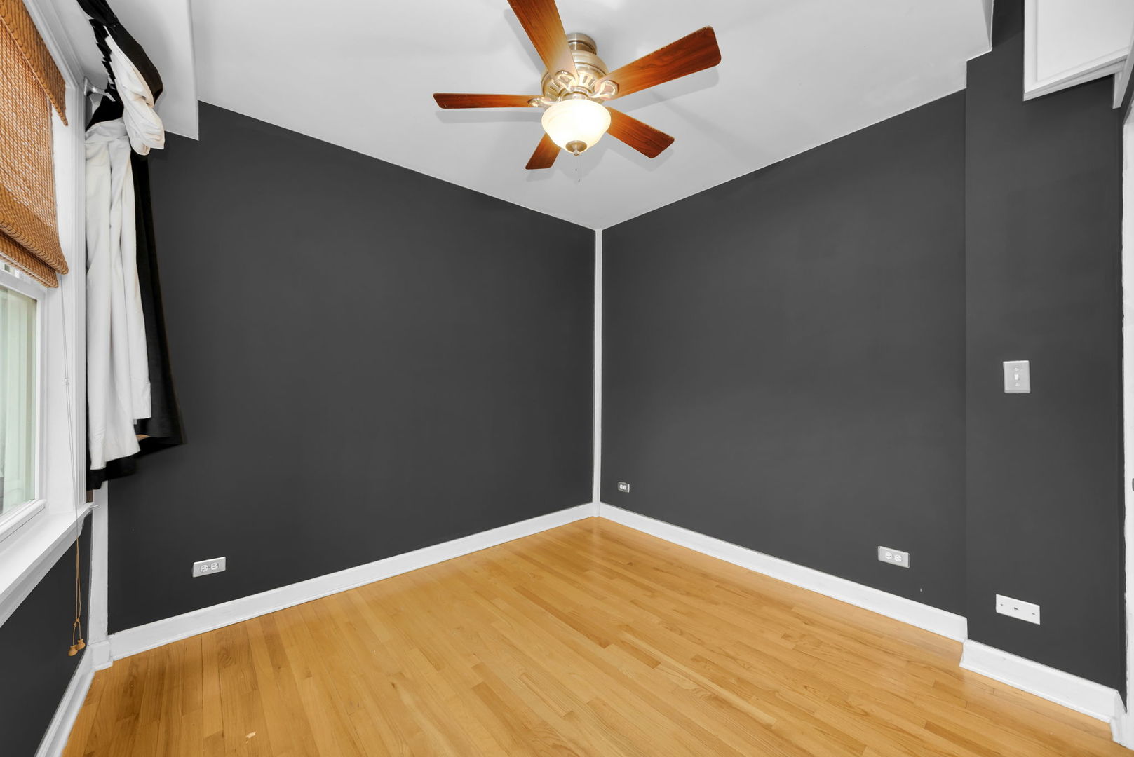4241 North Kimball Avenue, Unit 2 Chicago, IL 60618 - Photo 14 of 16 a view of a room with a ceiling fan