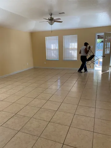 a living room with a large window