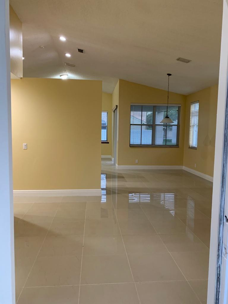 842 Briar Ridge Road Weston, FL 33327 - Photo 5 of 13 a view of an empty room with a window