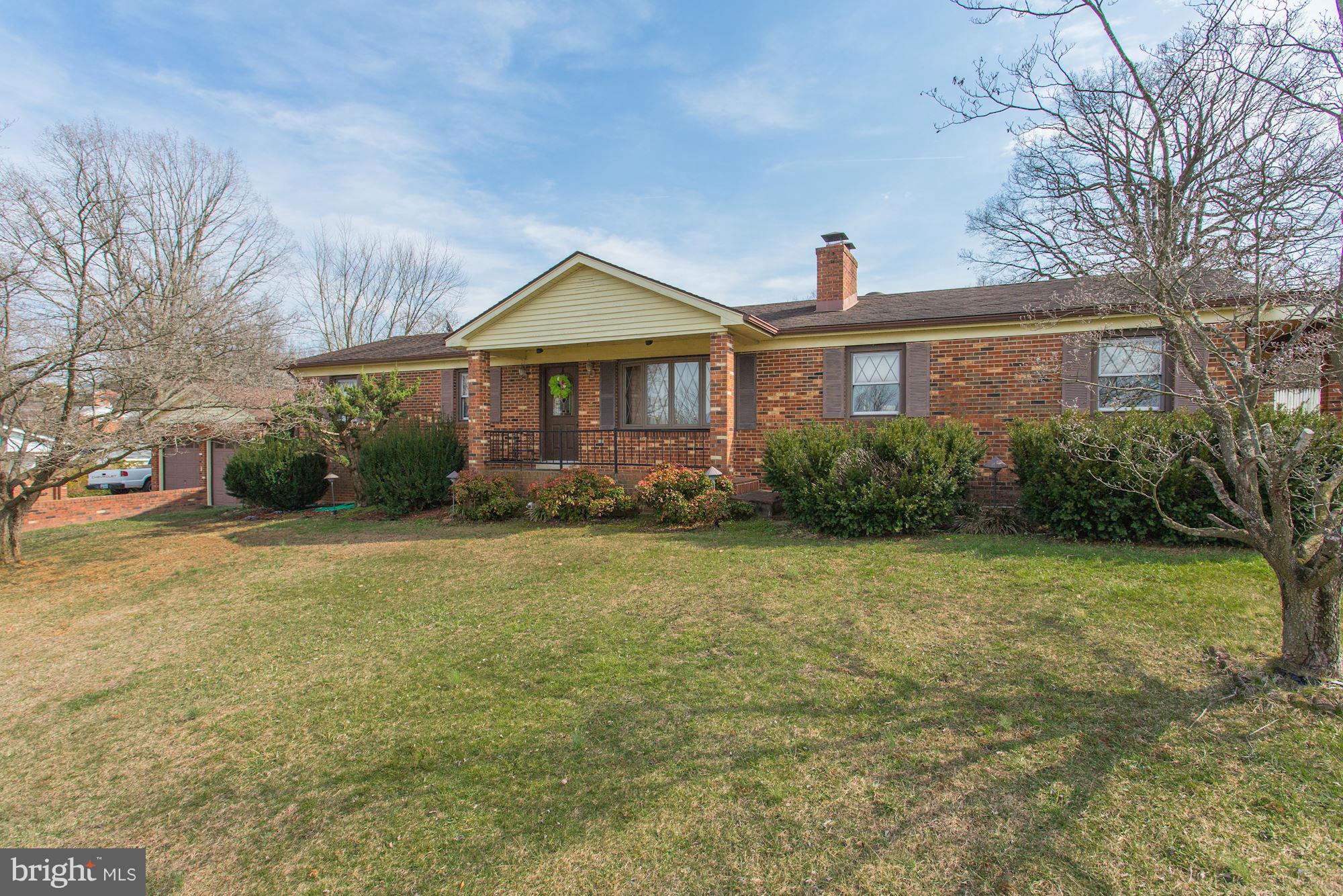 2 Nichols Road Luray, VA 22835 - Photo 1 of 30 a front view of a house with garden