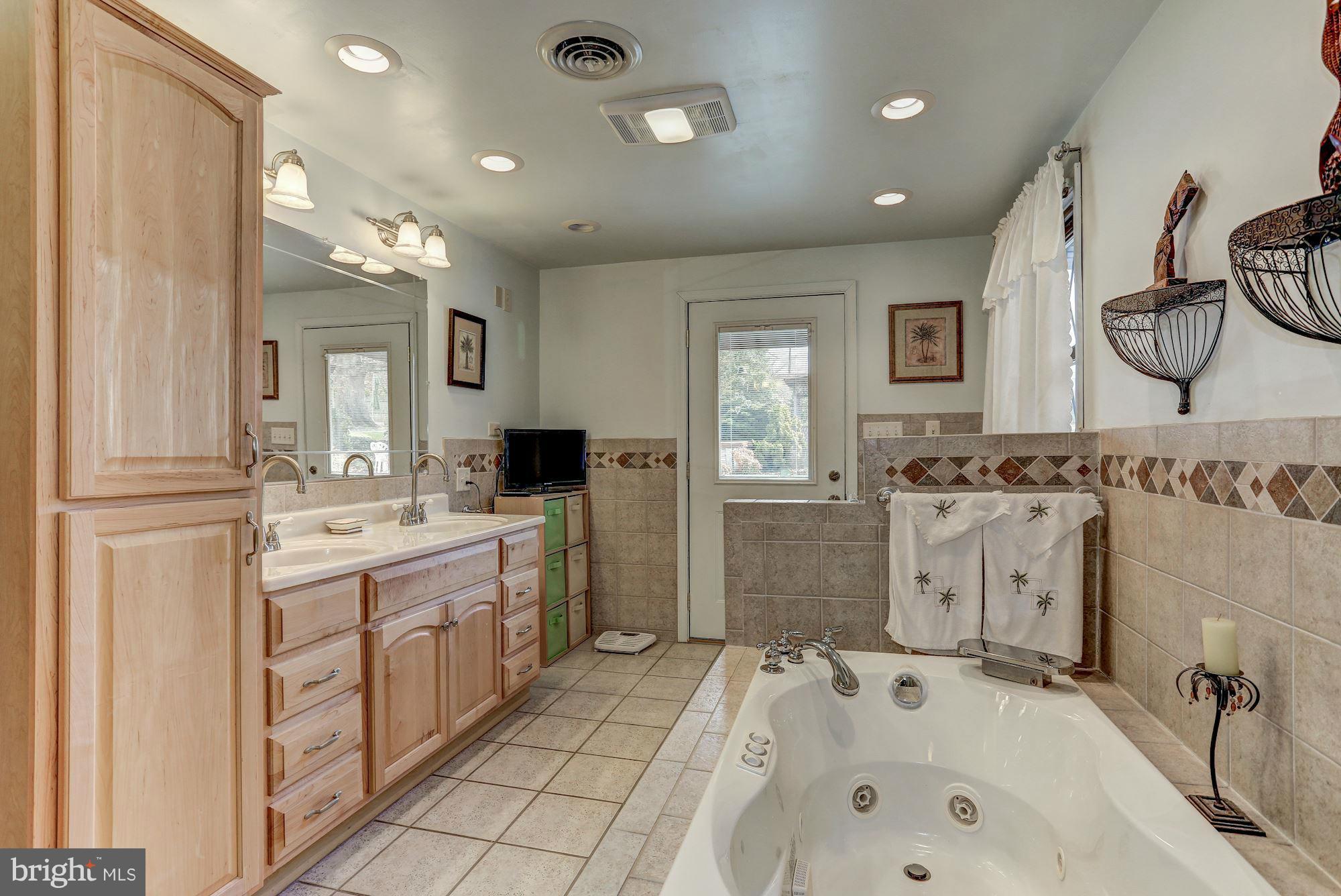 2 Nichols Road Luray, VA 22835 - Photo 13 of 30 a bathroom with a bathtub sink and mirror