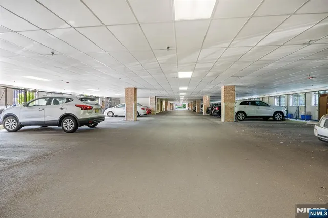 a view of a cars parked in front of a building