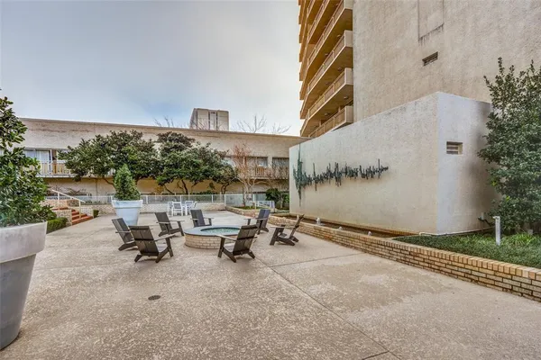 a view of a terrace with sitting area