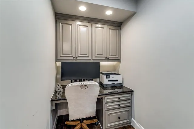 a view of workspace with furniture and natural light