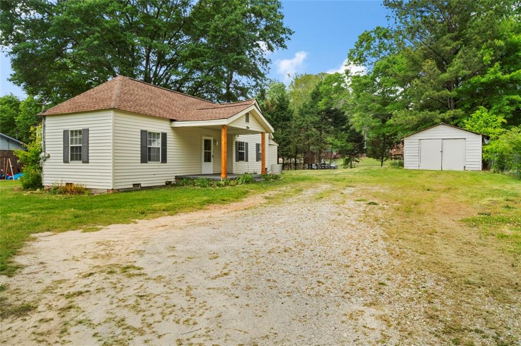 229 Manley Road Griffin, GA 30223 - Photo 1 of 1 a front view of a house with a yard and garage