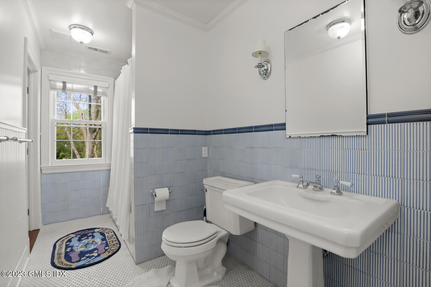 31 Fairfield Road Greenwich, CT 06830 - Photo 14 of 28 a bathroom with a sink a toilet and a mirror