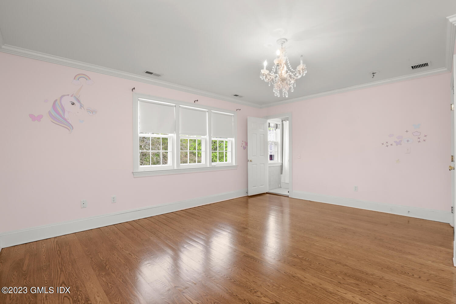 31 Fairfield Road Greenwich, CT 06830 - Photo 15 of 28 wooden floor in an empty room with a window
